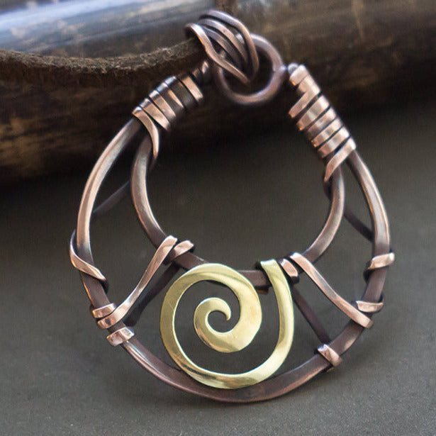 Minimal spiral necklace Sacred symbol Wire wrapped jewelry