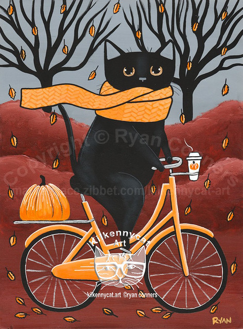 black cat autumn bicycle ride
