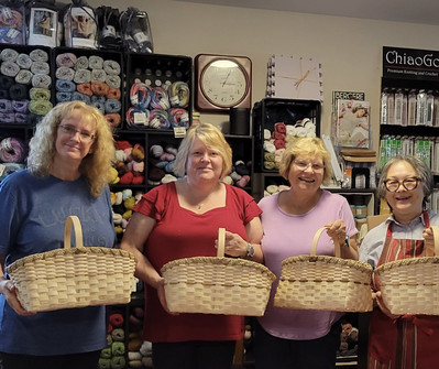 I took the third Beginner Basket Weaving Class too! Here are the 4 of us with our finished baskets!