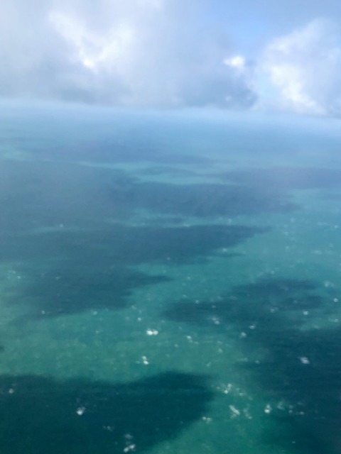 Caribbean hues? Waters of English Channel on approach to Jersey Airport, Channel Islands