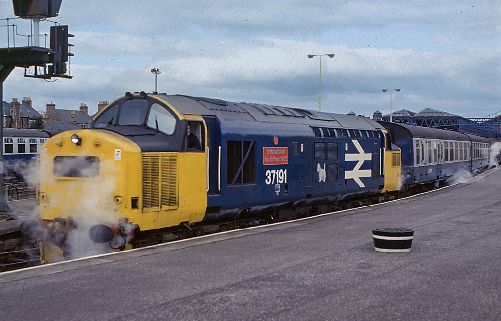 37191 International Youth Year 1985 at Stirling on passenger train, 13 March 1985