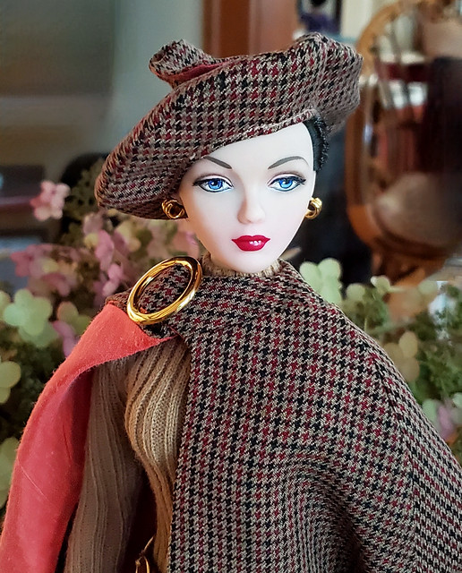 Hubby said she looks like she's going to take a walk on the moors.  :>)  I think she'd need sturdier shoes and probably wouldn't be wearing those earrings or belt.