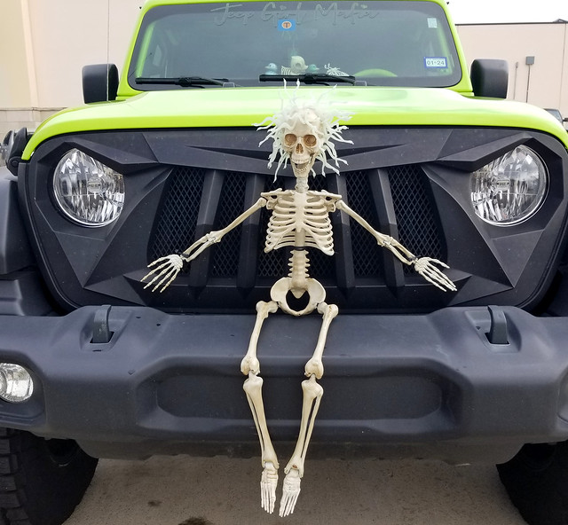 Green Jeep with Halloween decoration