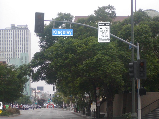 Westbound Wilshire Blvd. approaches, proceeds and crosses at all regular turns into Kingsley Drive followed by Harvard Blvd., Hobart Blvd., Serrano Avenue, Oxford Avenue and Western Avenue intersection of the intersections