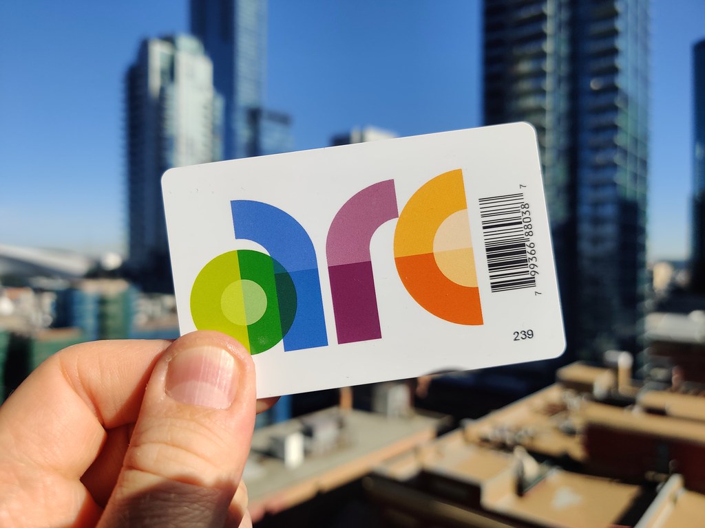 Edmonton Transit Arc Card set against the background of Edmonton's downtown