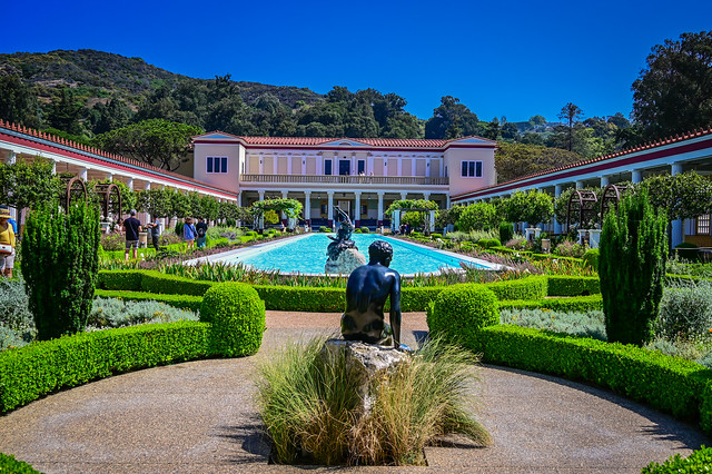 The outer peristyle and courtyard gardens with reflecting pond at The Getty Villa Museum - Pacific Palisades CA