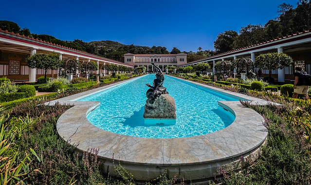 The outer peristyle and courtyard gardens with reflecting pond at The Getty Villa Museum - Pacific Palisades CA