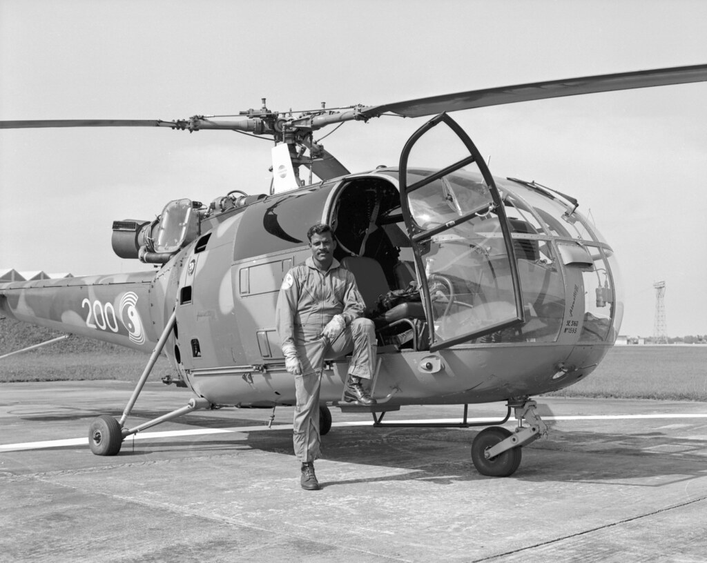 1977 Singaporean pilot & Singapore Air Force Aerospatiale Alouette III SE-3160 photo-ship at Singapore Air Force Base Tengah. This aircraft was used to take the aerial photographs of the 41 Sqn farewell flypast, 21 May 1977.