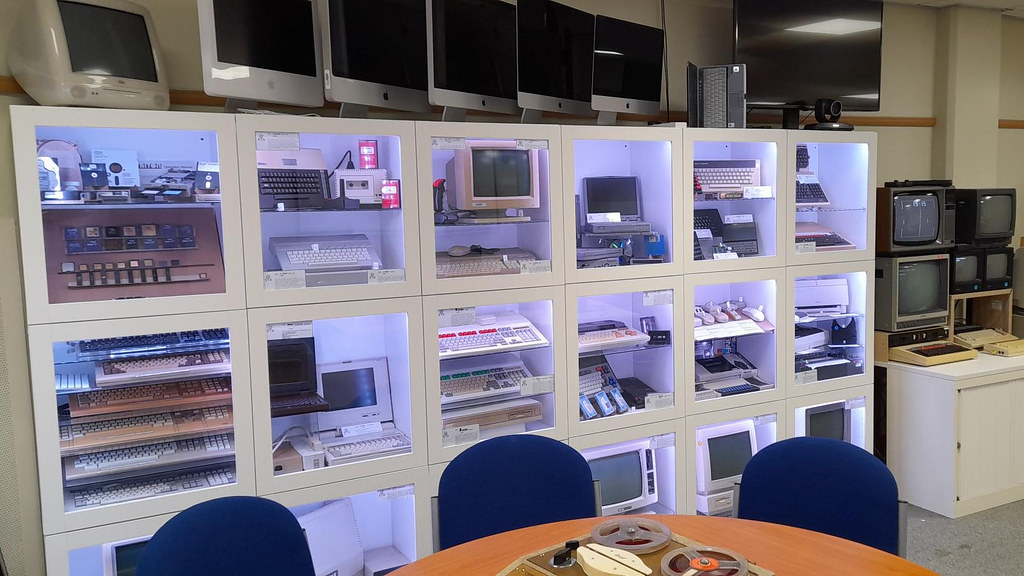 Shelves full of old computers on display