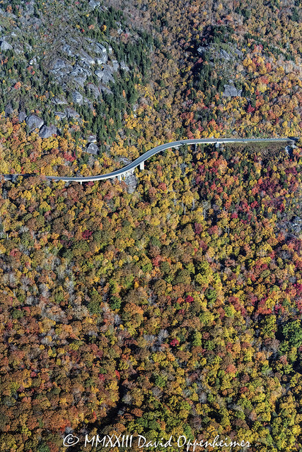 Linn Cove Viaduct on the Blue Ridge Parkway below Grandfather Mountain State Park with Autumn Colors in Western North Carolina Aerial View