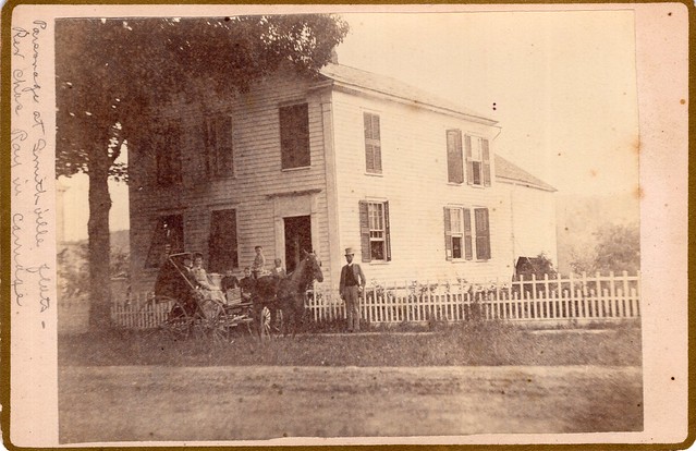 Cabinet Photo_outdoor portrait of group in front of parsonage at Smithville Flats with Rev. Chase and a woman in a horse-drawn buggy