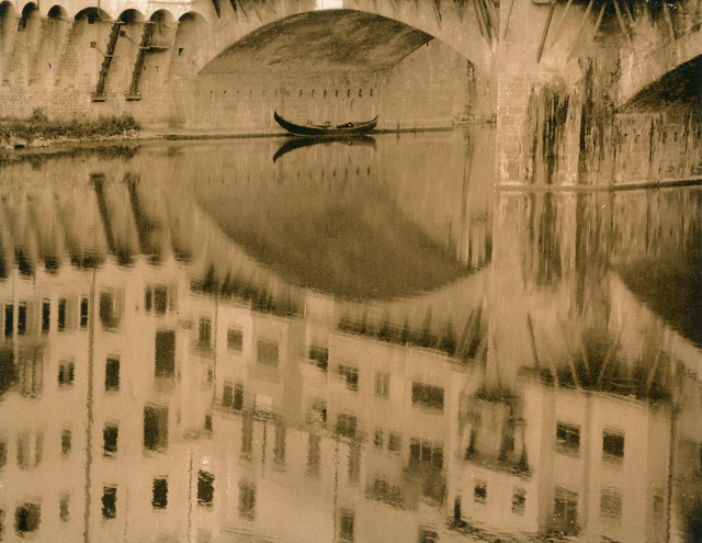 Reflection in Arno river at Ponte Vecchio bridge (2009(