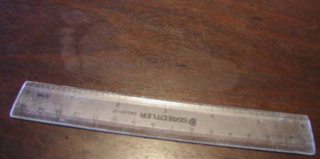 P2160185 Lucy's footprint on jarrah table