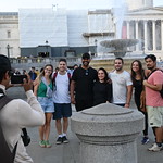 Fernando Raymond taking a photograph of tourists - Fountain and National Gallery , Trafalgar Square London
