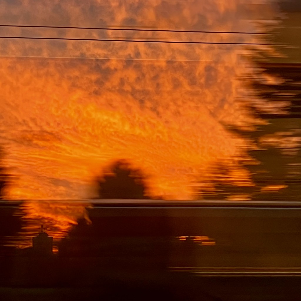 Morning sky, train window