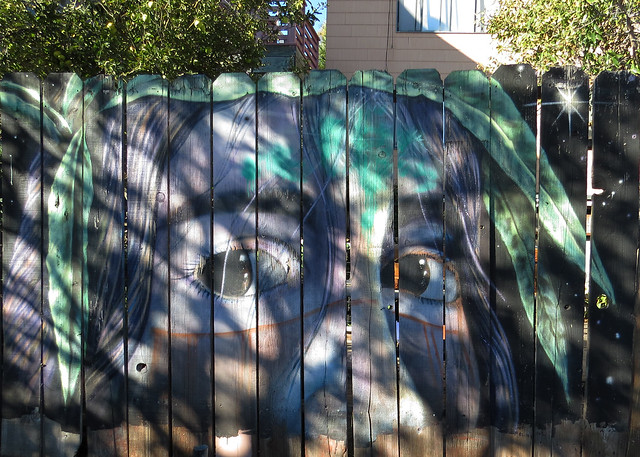 Female eyes mural on fence Grocery Outler supermarket South Van Ness Ave San Francisco five years later HFF  20231017-154501