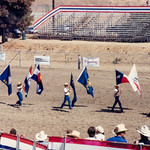 SF Bay Area 1987 Gay Rodeo (# 0009) Opening ceremony at one of the events of the 1987 International Gay Rodeo Finals in Hayward, CA. If my memory is correct, the rodeo lasted over multiple days and this was not one of the main events, thus the relatively scarce attendance in these photos.  I thought that this rodeo was a follow-up from rodeos in previous years in the Bay Area, but per an &lt;u&gt;&lt;a href=&quot;https://www.latimes.com/archives/la-xpm-1985-03-31-mn-18784-story.html&quot; rel=&quot;noreferrer nofollow&quot;&gt;LA Times&lt;/a&gt;&lt;/u&gt; story, the first Gay Rodeo in California was in LA’s Griffith Park in 1985.  
 
There is a good history of gay rodeos on &lt;u&gt;&lt;a href=&quot;https://en.wikipedia.org/wiki/International_Gay_Rodeo_Association&quot; rel=&quot;noreferrer nofollow&quot;&gt;Wikipedia&lt;/a&gt;&lt;/u&gt; and I was surprised to see that the &lt;u&gt;&lt;a href=&quot;https://theautry.org/about-us/press/autry-museum-american-west-presents-damn-horse-stories-gay-rodeo-performance-brings&quot; rel=&quot;noreferrer nofollow&quot;&gt;Autry Museum of the American West &lt;/a&gt;&lt;/u&gt; in LA’s Griffith park is a repository of Gay Rodeo information and recently put on a performance entitled &lt;i&gt;That Damn Horse: The Stories of Gay Rodeo&lt;/i&gt; -- there’s a wonderful lead photo on the Autry’s webpage.   In researching this, I also discovered an online newsletter called &lt;i&gt;Wide Open Country&lt;/i&gt; which has a good history titled &lt;i&gt;&lt;u&gt;&lt;a href=&quot;https://www.wideopencountry.com/gay-rodeos/&quot; rel=&quot;noreferrer nofollow&quot;&gt;Drag Queens, Goat Dressing and Hardcore Athletes: Inside the History &amp;amp; Future of Gay Rodeos&lt;/a&gt;&lt;/u&gt;&lt;/i&gt; with multiple very good photos.