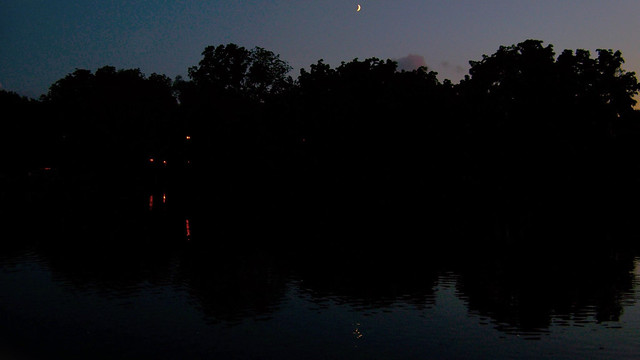 Dusk reflections on a crescent-moonlit night