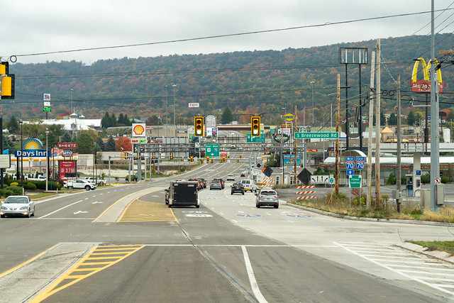 Breezewood, Pennsylvania - October 20, 2023: View down the unusal I-70 Pennsylvania turnpike interchange, routes traffic through gas stations, fast food restaurants, and hotels, known as a tourist trap and choke point