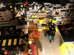 LEGO Classic Space: Under-city: Eco-terrorists starting fire to lure a fire-brigade-bot to extinguish it so they can destroy the nasty mechanised abomination in their zealous technophobia ( sci-fi AFOL MOC with minifigures and a robot ) Toy hobby pics