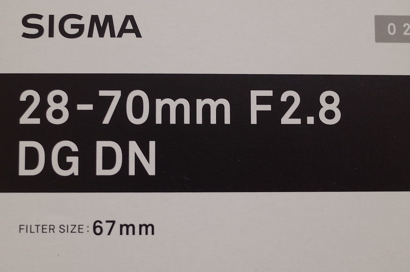 012Ricoh GRⅡ SIGMA28 70mm F2 8 DG DNロゴ
