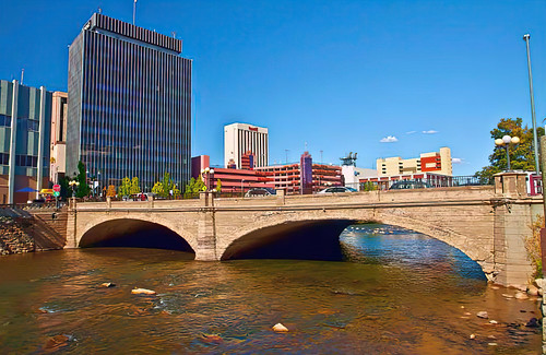 horizontal day outdoors outside river bridge cloudless cityhall reno nv vehicles people virginiastreetbridge truckeeriver waterway hdr highdynamicrange skyscrapers buildings structurs archiecture city nevada