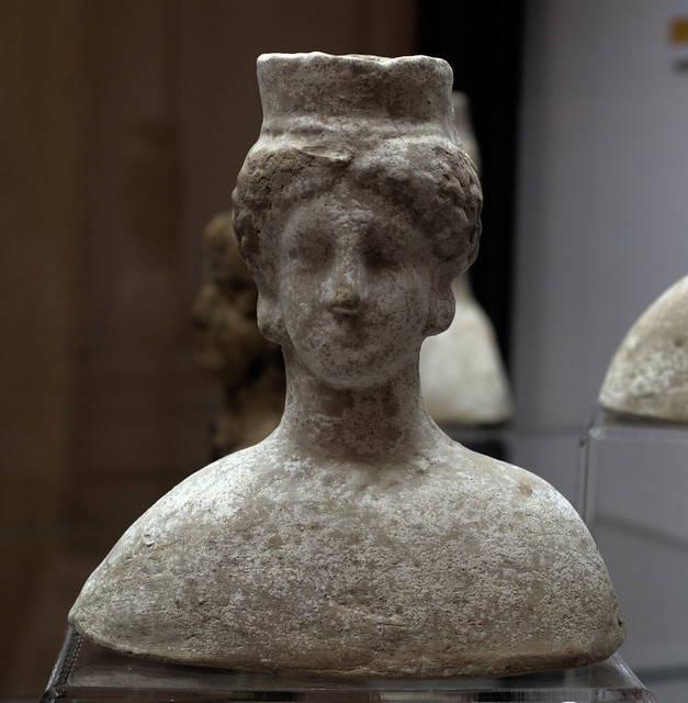 Another terracotta female bust with polos, from Acerra