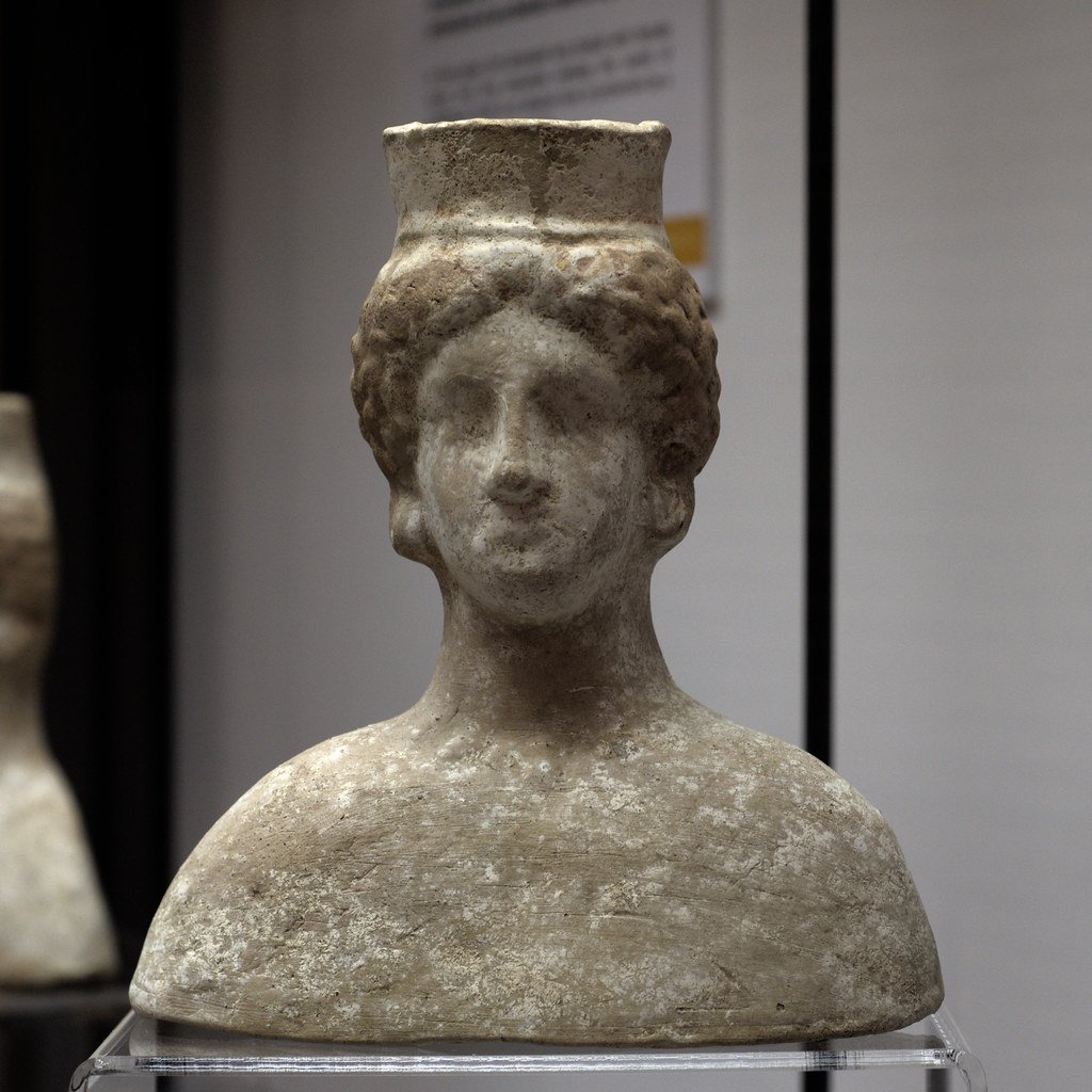A further terracotta female bust with polos, from Acerra