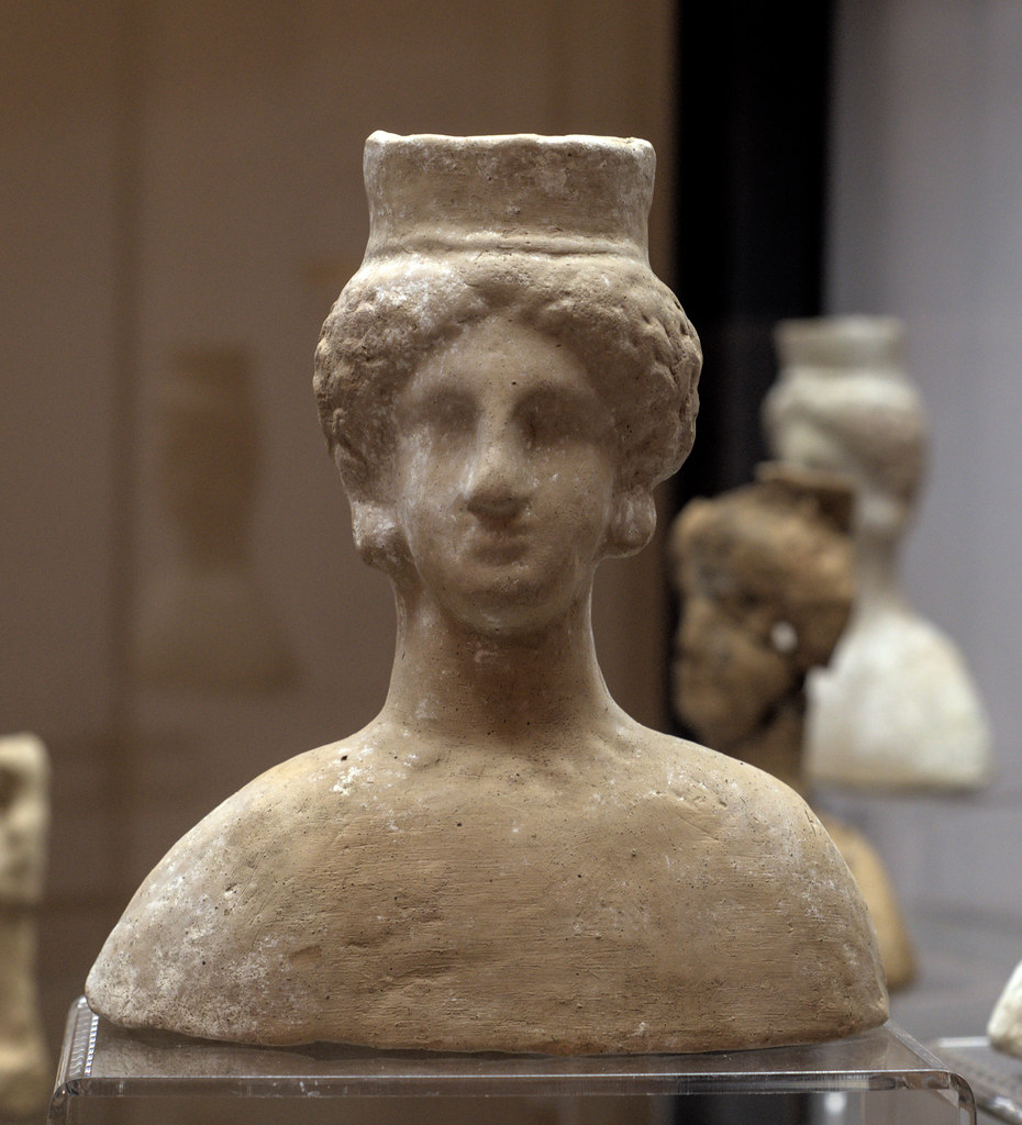 Terracotta female bust with polos, from Acerra