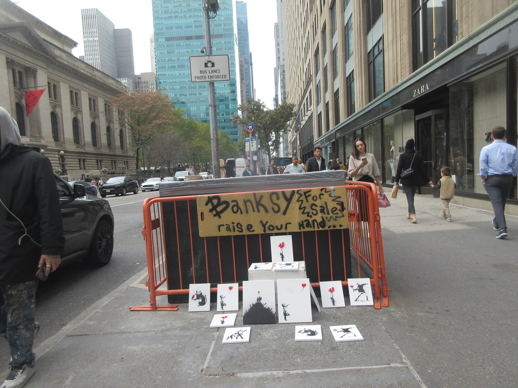 2023 Artist selling Banksy or Fakesy canvases off 5th Avenue and 42nd street 5205