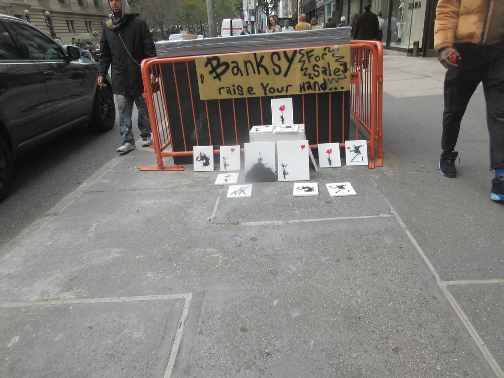 2023 Artist selling Banksy or Fakesy canvases off 5th Avenue and 42nd street 5203