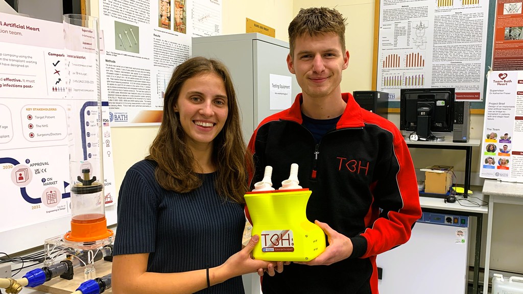 Team Bath Heart members Fleur Upton and Marcell Kuba with the prototype total artificial heart