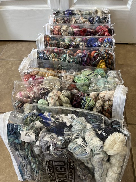 Koigu Festive 25 Day Kits contain 25 Demi skeins of KPPPM with 87 yards each (2175 yards total). Winter/Summer Solstice Jasmine Kits contain 24 Demi skeins of Jasmine DK with 60 yards each (1440 yards total).