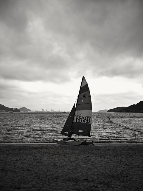 A sailboat on the beach