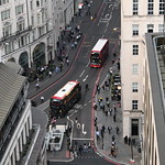 London buses and traffic seen from The Monument London