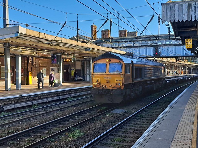 66 788 hauls an intermodal train through Ipswich Station.