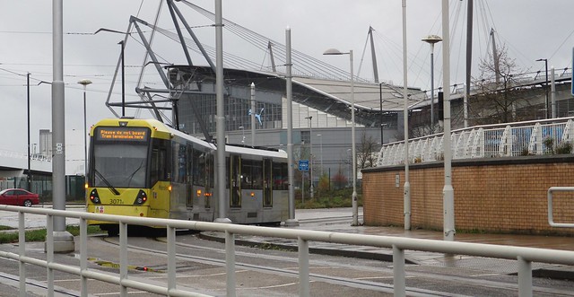 Manchester Metrolink 3071 tram passing Etihad Stadium