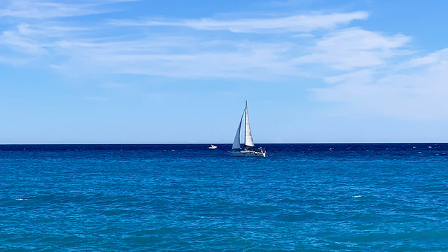 Sailboat And Blue Sea.