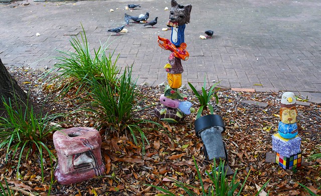 niave sculptures + pigeons feeding