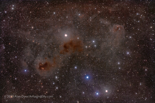 Dust Clouds in the Hyades Star Cluster