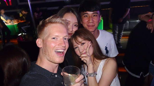 having a drink with the locals at MUSE Tainan Nightclub in Taiwan in Tainan, Taiwan 