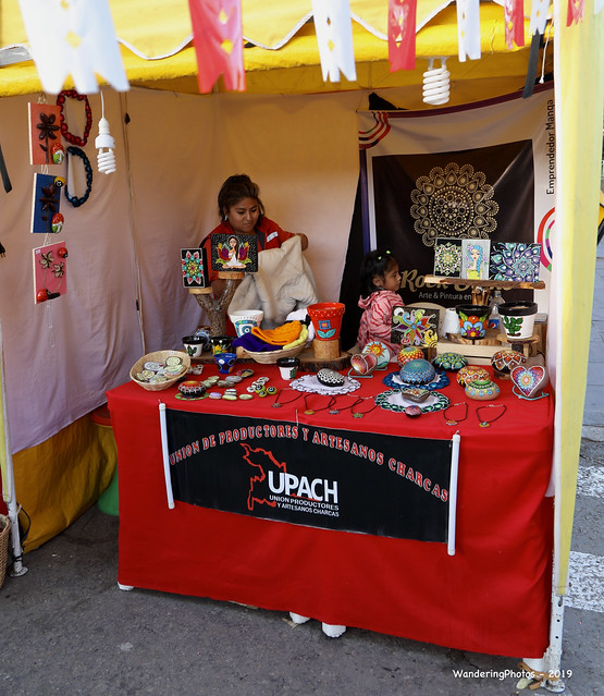 Artisan Tourist Souvenirs on a red table - Street Market - Bolivar Park - Sucre Chuquisaca Bolivia