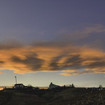 22. November 2023 - 16:45 - This pano shows a band of lenticular clouds at sunset.  This is indicative of an approaching cold front with strong winds aloft.  Two days later, 7 inches of snow fell with temperatures falling 60F (to a low of 3F).