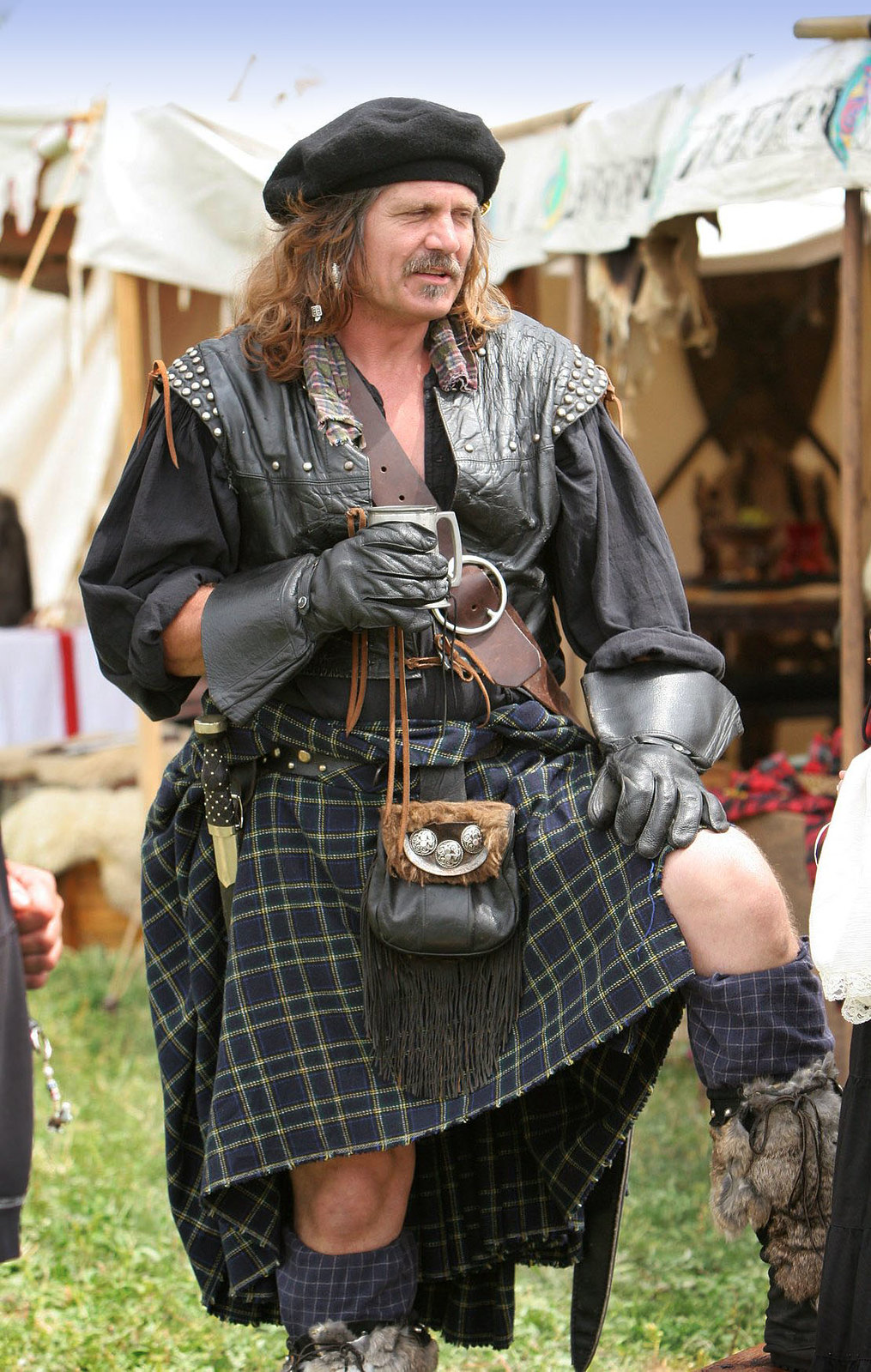 A belted plaid (rather than a kilt) as worn by a reenactor of Scottish history.