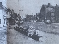 Newspaper copy ,entrance to Hensmans petrol station ,Billericay ,Essex -Red Lion pub in shot.