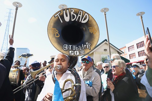 Second line parade to WWOZ's new location on Nov. 28, 2023. Photo by Michele Goldfarb.