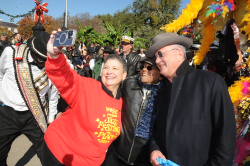 Beth Arroyo Utterback with John Boutte and Paul Sanchez at WWOZ's moving day second line parade on November 28, 2023. Photo by Black Mold.