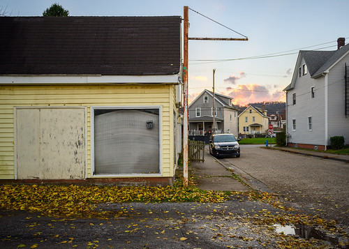 Closed Monday by joespix, storefront window yellow blind windowblind puddle fallen leaves fall fallcolors street asphalt parke