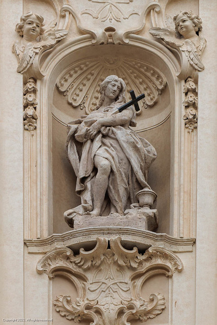 Stone statue on the church wall - St.Mary Magdalene