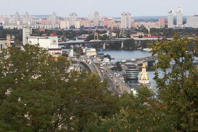 December 3, 2023. The 648th day of war in Ukraine. A view from the  St. Volodymyr's Hill to Podil (Naberezhno-Khreschatytska Street), the Dnieper, the harbor bridges and residential area Obolon. Kyiv.